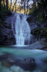 Fototapeta na wymiar waterfall in the forest in tuscany