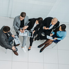 top view. handshake of business colleagues during a working meeting