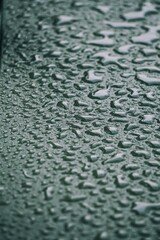raindrops on the metallic surface, abstract background