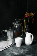Hot espresso and milk on black table on focus and light in background