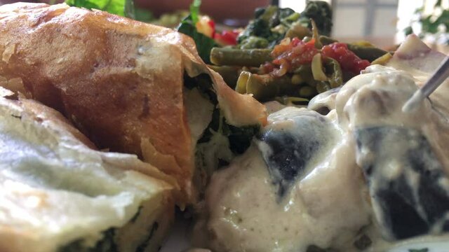 Traditional Turkish b&ouml;rek close up video, Turkish b&ouml;rek, Bulgarian Burek food, vegetable dish, olive oil dish