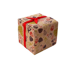 The isolated gift box in craft packaging with red ribbon 