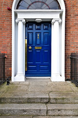 A typical blue georgian wooden door in the Merrion Square neighborhood