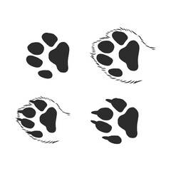 A set of dog's paws. Black traces in different styles. Isolated on white background. Silhouettes of paws. Vector illustration. cat paw trace, vector sketch illustration