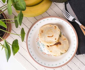 Venezuelan Arepas filled with cheese, banana and avocado.