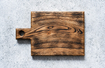 Cutting board on a light concrete background.
