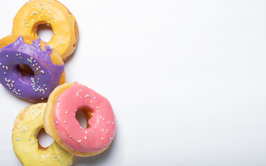 donuts on a white background with place for text. View from above.