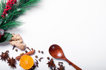 Various aromatic spices for making mulled wine on a white background.Flat lay. Place for text....