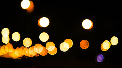 Colorful of bokeh traffic light at night
