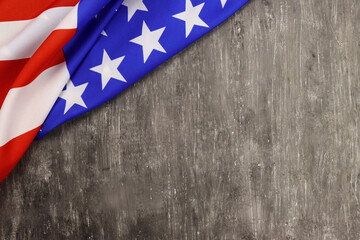 United States of America flag on a gray background close up with space for text