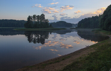 Naklejka na ściany i meble The sunset on the lake Sapsho. Smolenskoe Poozerye national Park. Russia