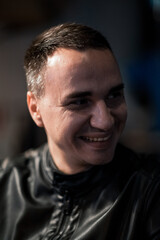 Obraz premium Portrait of a handsome young man. Shooting in a bar