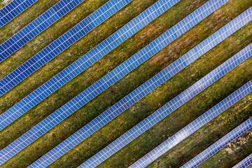 many rows of  Solar panels top view. solar power plant. 