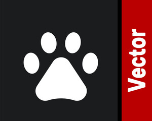 White Paw print icon isolated on black background. Dog or cat paw print. Animal track. Vector.