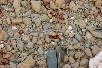 Top view of wreckage of a demolished building. Broken down building for reconstruction.