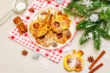 Christmas or New Year sweet apple puffs, fresh homemade bakery