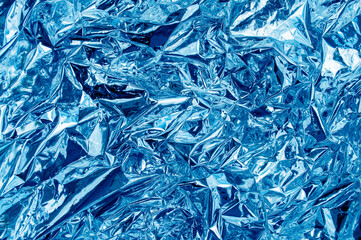 Abstract texture crumpled blue foil sheet