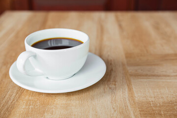Coffee cups on wooden table