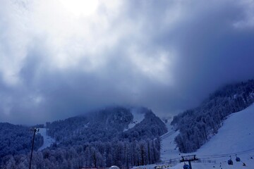 Winter landscape in the mountains of the Caucasian ridge, ski slopes.
