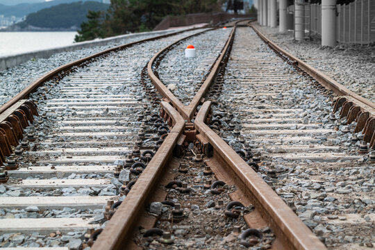 an old, rusty railroad that intersects.