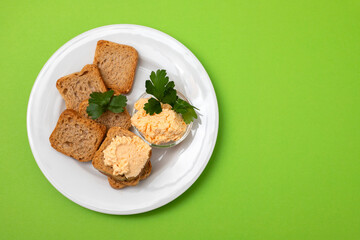 toasts with fish pate on white plate