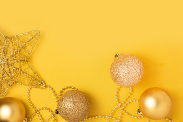 Christmas yellow decorations a on Illuminating colored background.