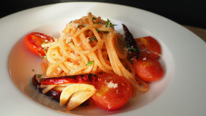 pasta cooking with tomato sauce and chili and garlic,OLYMPUS DIGITAL CAMERA