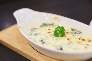 Eating baked food with topped parsley