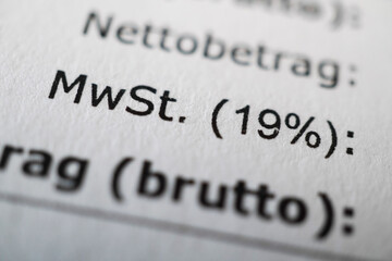 Mehrwertsteuer or MWSt - value-added tax or VAT in German - macro of receipt with shallow depth of field - obrazy, fototapety, plakaty