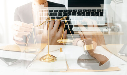Business and lawyers discussing contract papers with brass scale on desk in office. Law, legal services, advice, justice and law concept picture with film grain effect