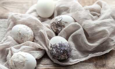 Original decorated Easter eggs close up on sacking cloth.