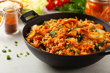 Kimchi cabbage with chicken. Prepared in a wok.