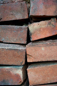 A pile of bricks stacked up.