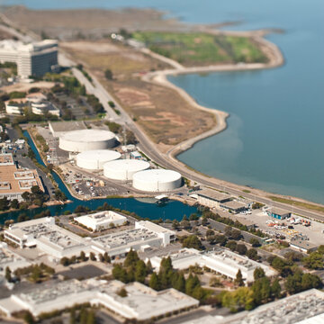 Urban sprawl with factory or processing plant.