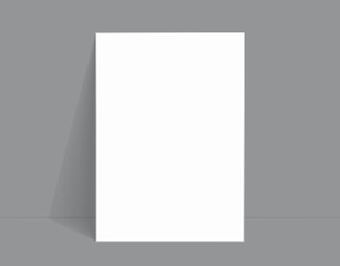 White poster mockup standing on the floor near Ultimate Gray color wall. Blank Canvas Mockup for design.