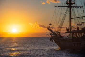 Old Ship expedition at sunrise. Travel and freedom concept.