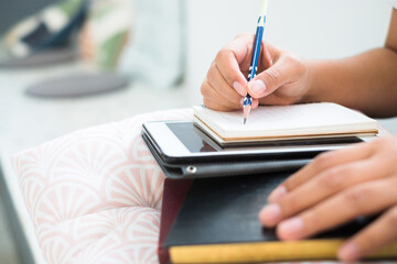 Fototapeta premium Writing Information on Notebook