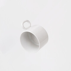 Beautiful white porcelain tea cups isolated on a white background