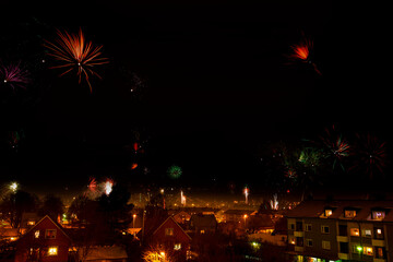 Fototapeta premium Cityscape view with fireworks on the sky