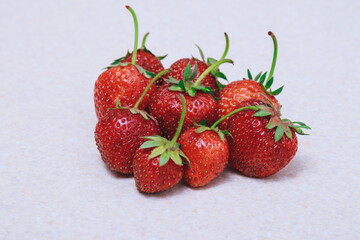 Fresh ripe strawberries on white . Close-up. Macro.
