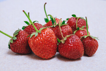 Fresh ripe strawberries on white . Close-up. Macro.