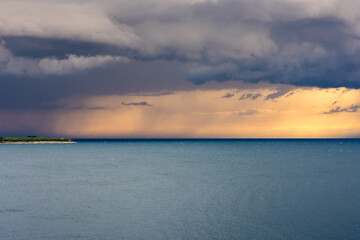 Heavy storm on the sea with a ship.