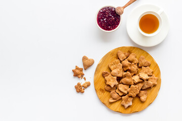 Freshly baked butter cookies with tea, top view