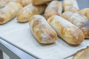 Ciabatta bread on the table. Making craft bread at the bakery