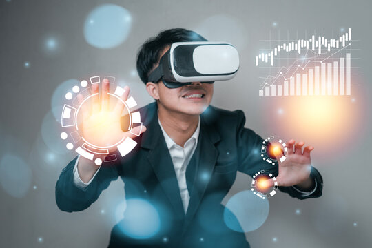 Man is wearing virtual reality goggles and his hands are touching. Connect the virtual world of the future communication media and business trade make work life more of the development of technology.