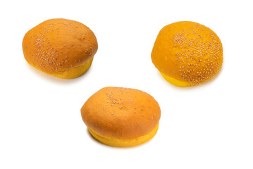 Yellow burger bread isolated on white.