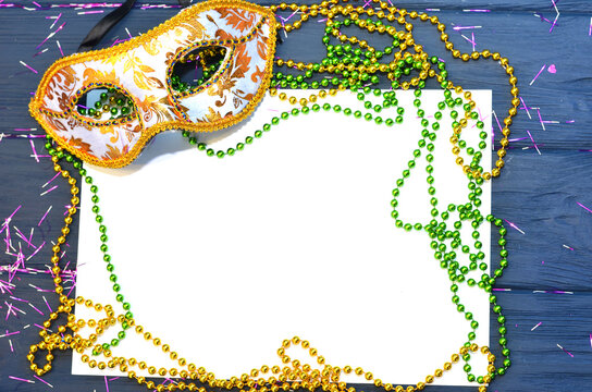 Mardi gras mask and beads frame for text on white space background. Madi gras celebration fat tuesday carnival