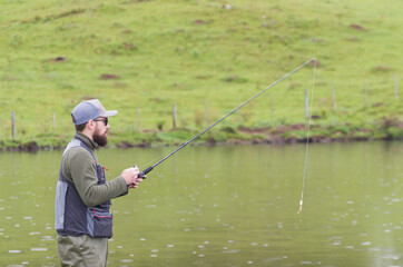 Black bass fisherman in close up