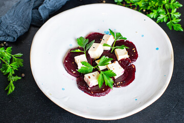 salad beet, pear and cheese organic snack ready to eat on the table healthy meal snack  top view copy space for text food background rustic