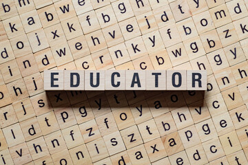Obraz premium Educator word concept on cubes